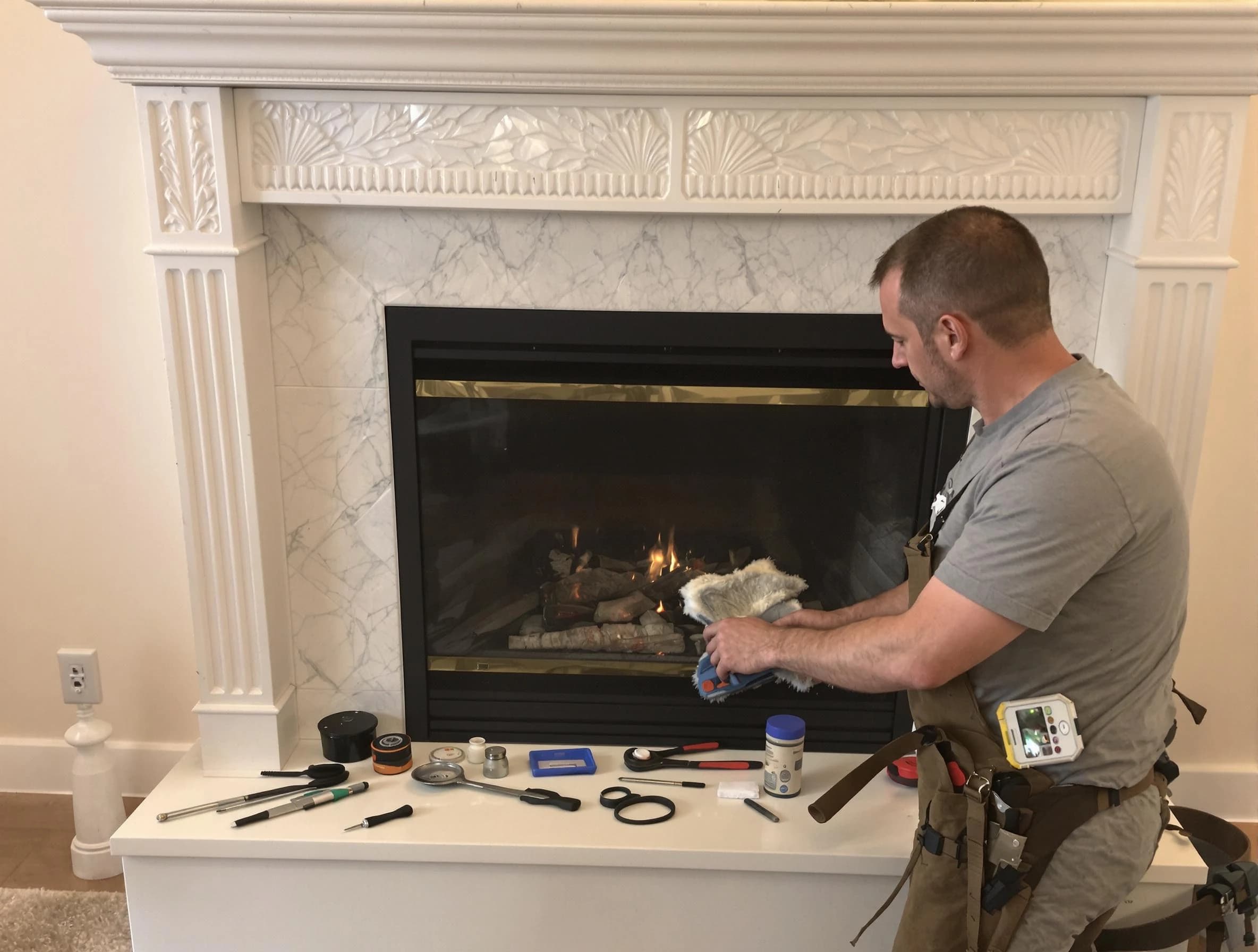Heron Bay Chimney Sweep performing fireplace maintenance in Heron Bay, GA